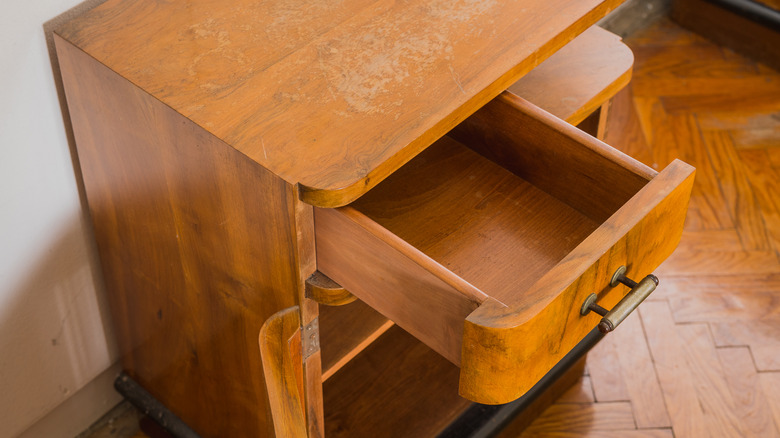 open drawer in wooden furniture