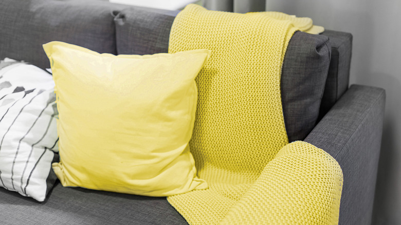 Bright yellow pillows on couch