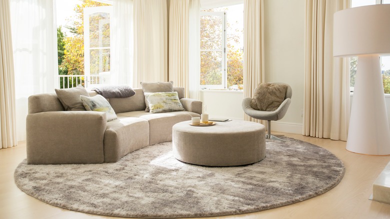 Room with round ottoman