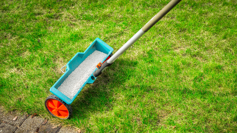 A lawn being fertilized