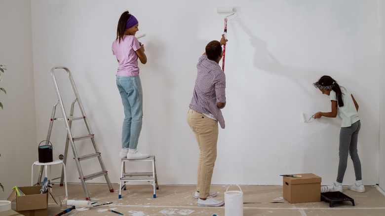 family painting wall