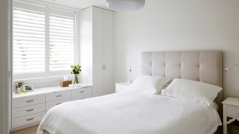 Bedroom with built-in cabinet