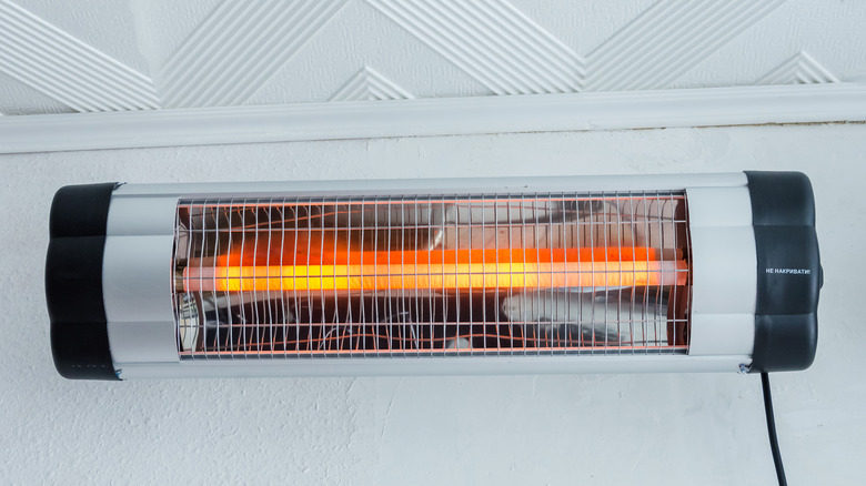 space heater on wall in bathroom