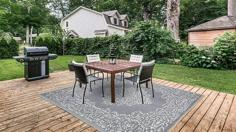 Deck with table and rug