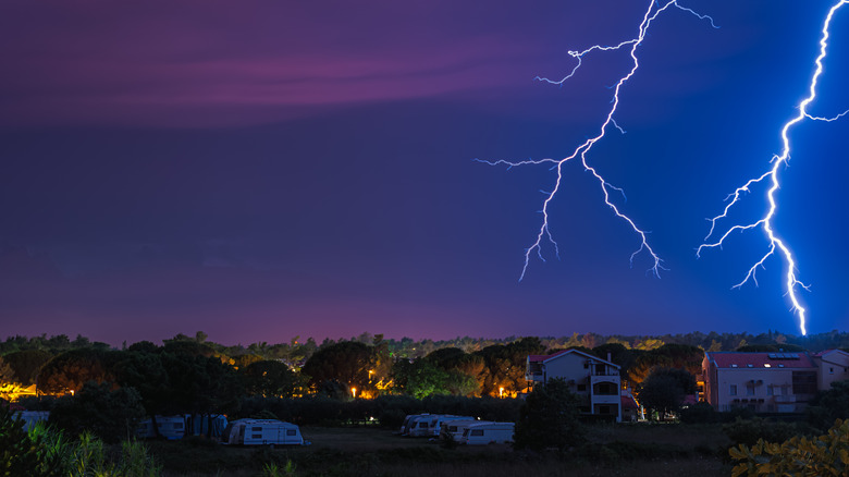 lightning over houses