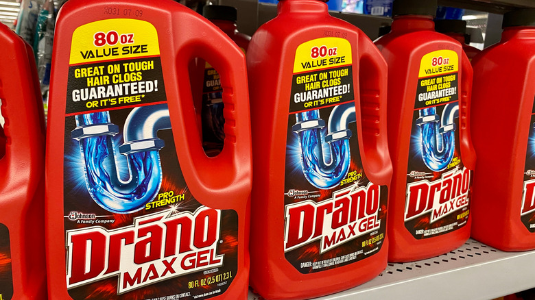 Red bottles of Drano on a store shelf