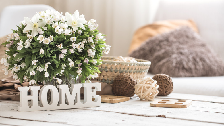 HOME sign with flowers