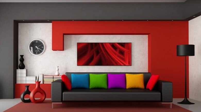 Black couch and red wall