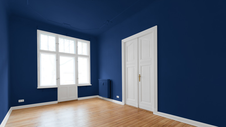 dark blue walls and ceiling