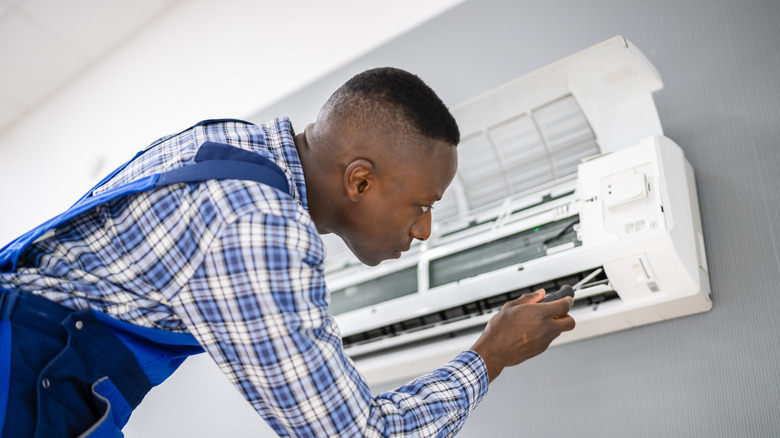 Person installing ac