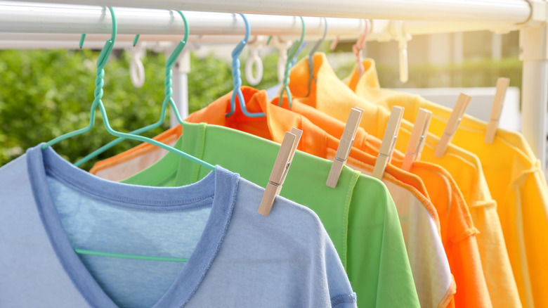 drying clothes outside with hangers