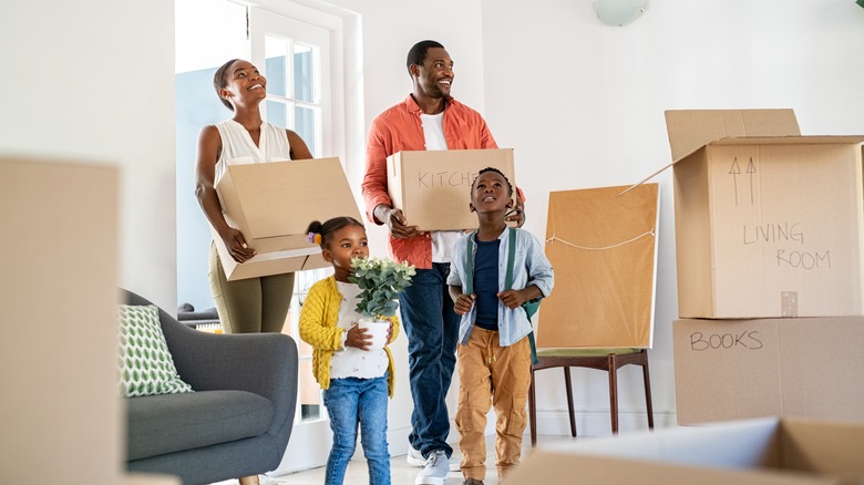 family with moving boxes