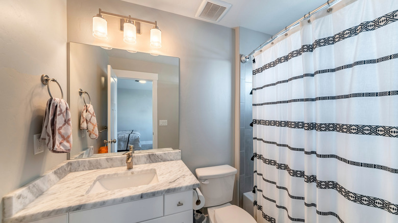 bathroom with little natural lighting