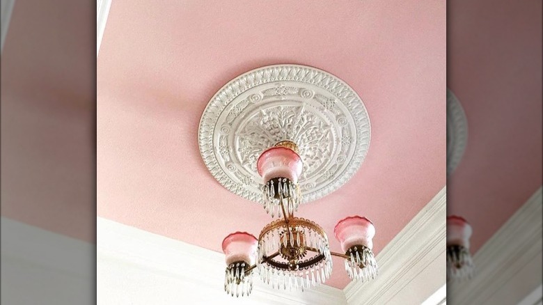 Pink ceiling with light medallion