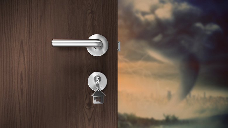 door with key storm background