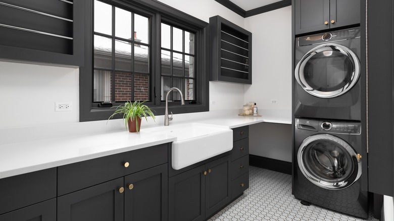 elegant laundry room with sink