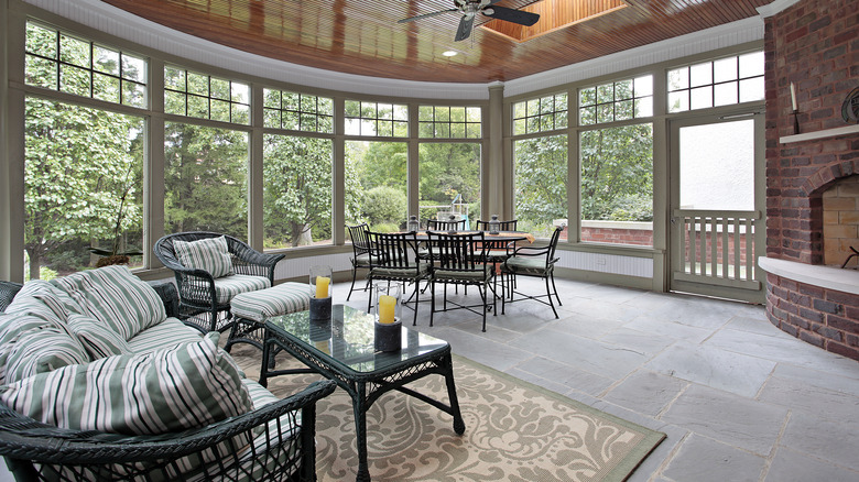 Screened-in porch with fireplace