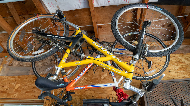 bikes hanging from shed ceiling