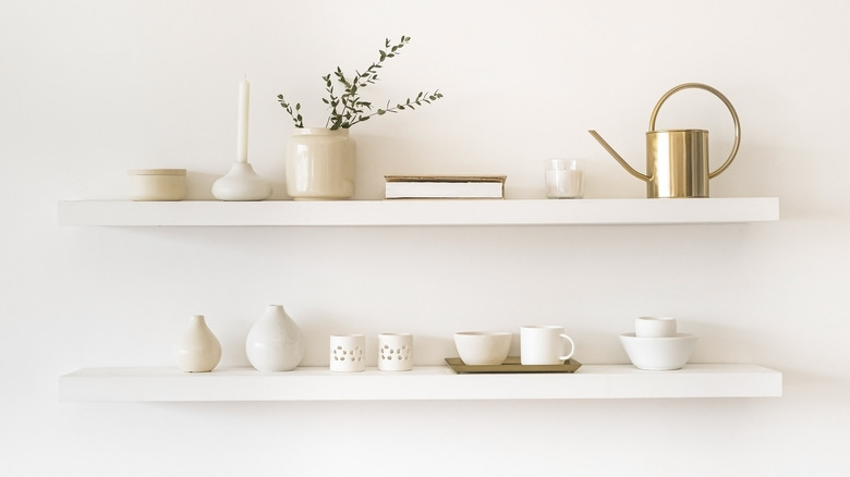 White shelves with matching pieces