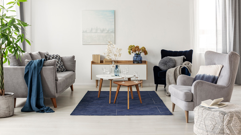 Living room around a blue rug