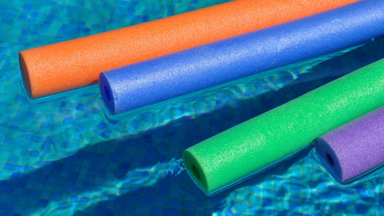 pool noodles in water