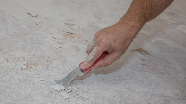 scraping gunk off subfloor