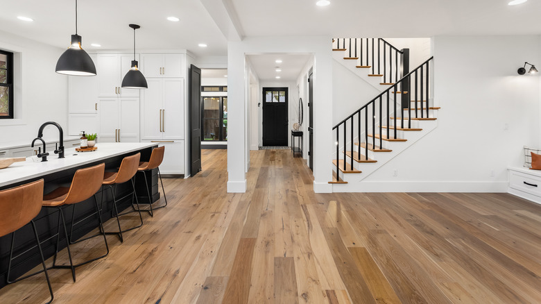 Modern, open living space with hardwood floor
