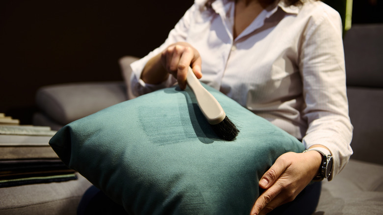 Dusting velvet couch pillow