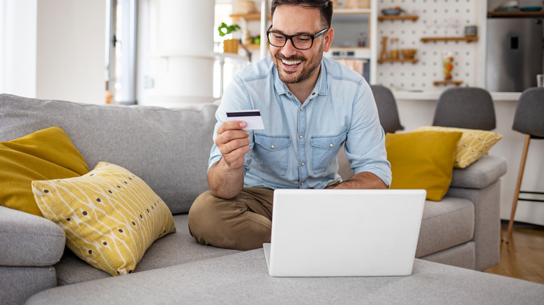 adult man doing online shopping