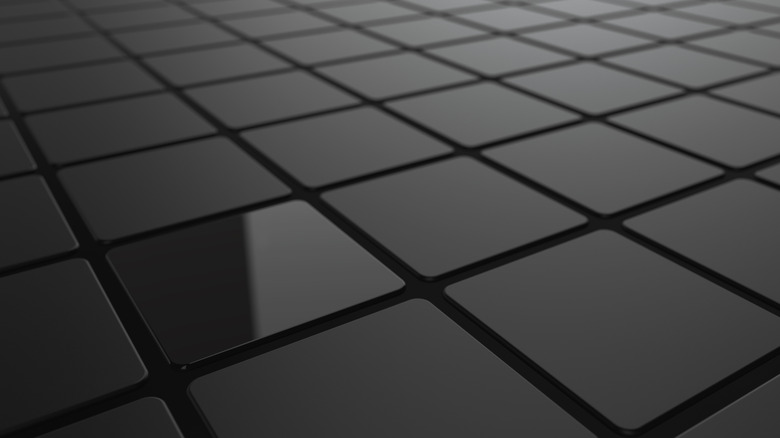 one glossy tile among matte