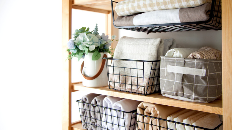 organized linen storage shelf