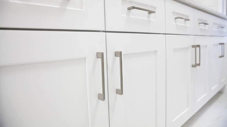 Close-up of white Shaker cabinets