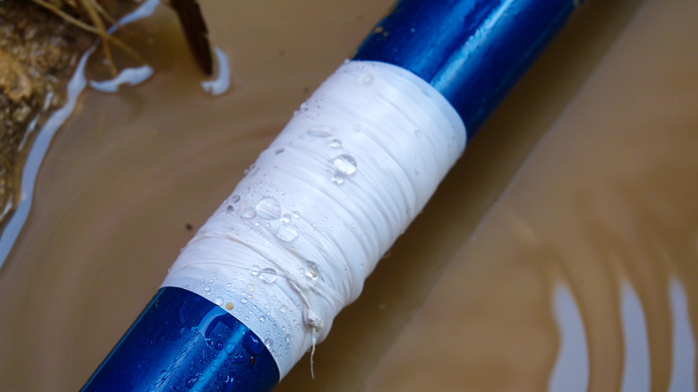 Broken pipe repaired with tape