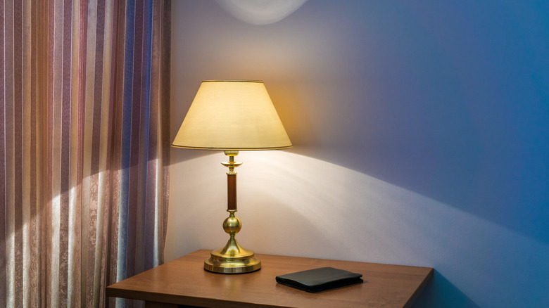 a lamp on side table