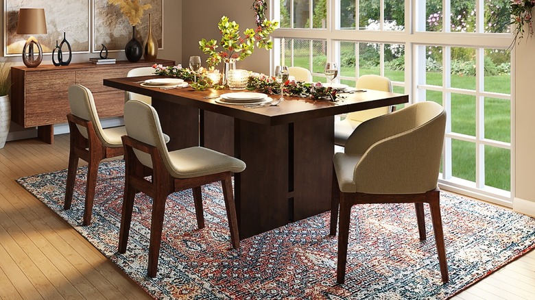 Patterned rug in dining room