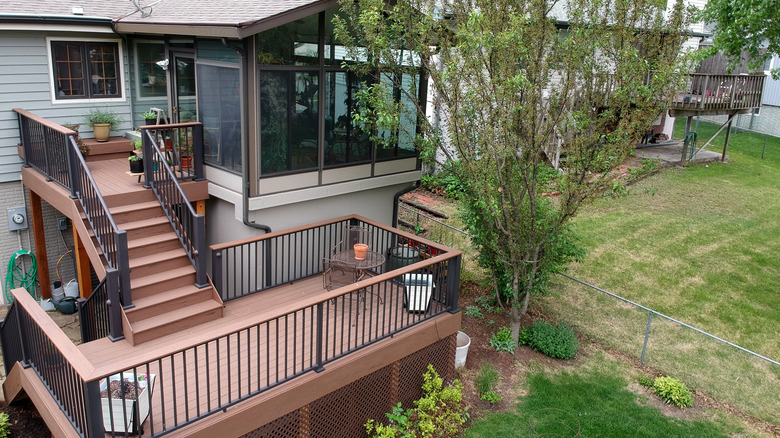 House with deck and sunroom