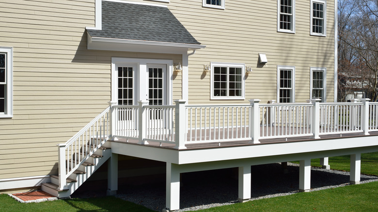 White railing and brown deck