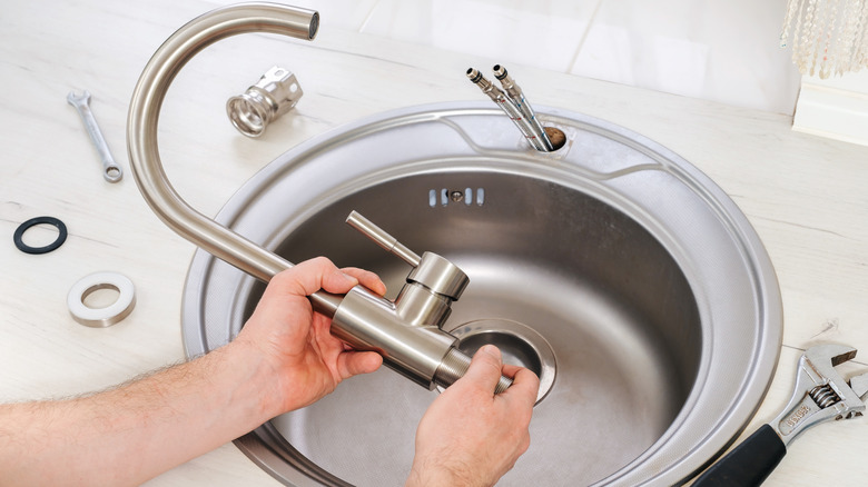 modern kitchen with faucets