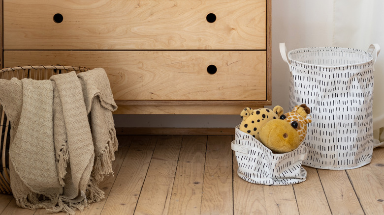 woven and white toy baskets