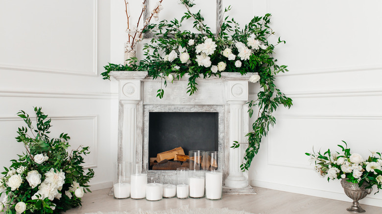 candles in front of fireplace