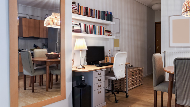 floating shelves above a desk