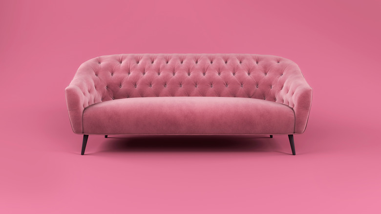 pink couch on pink background