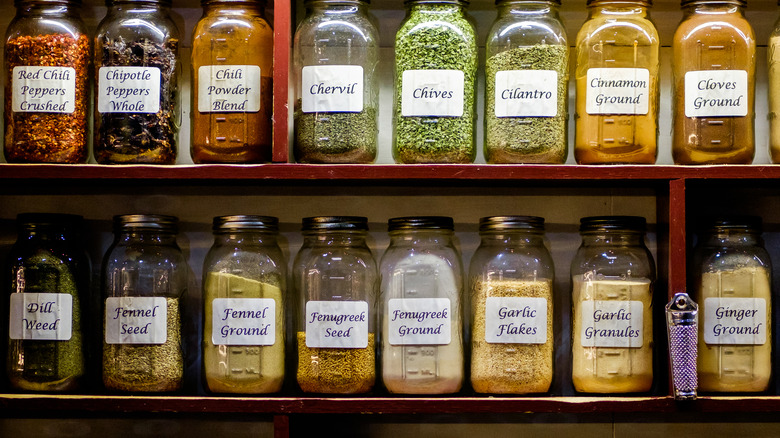 alphabetically arranged spices in jars