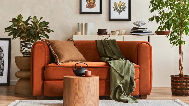 Orange couch with décor