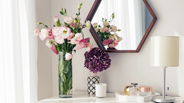 dresser with fresh flowers