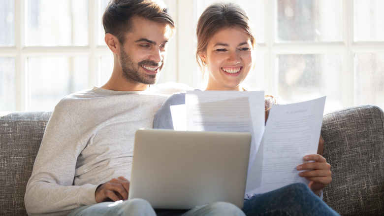 Couple reading over documents