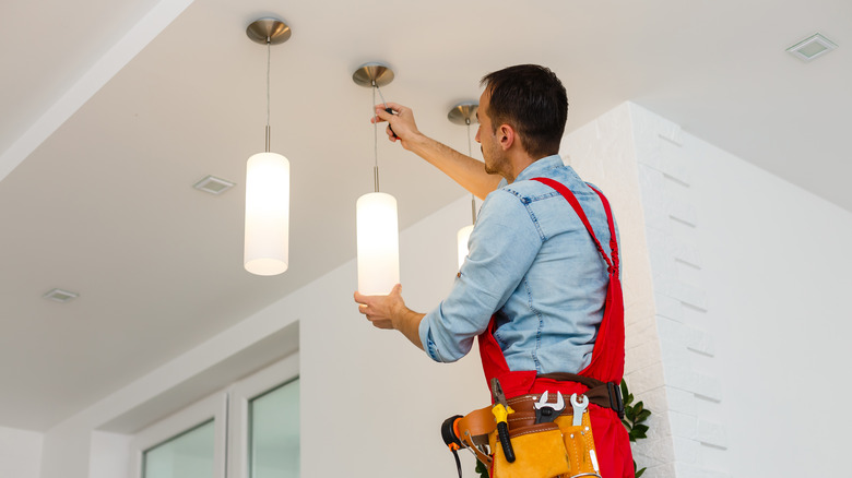 electrician installing new lights