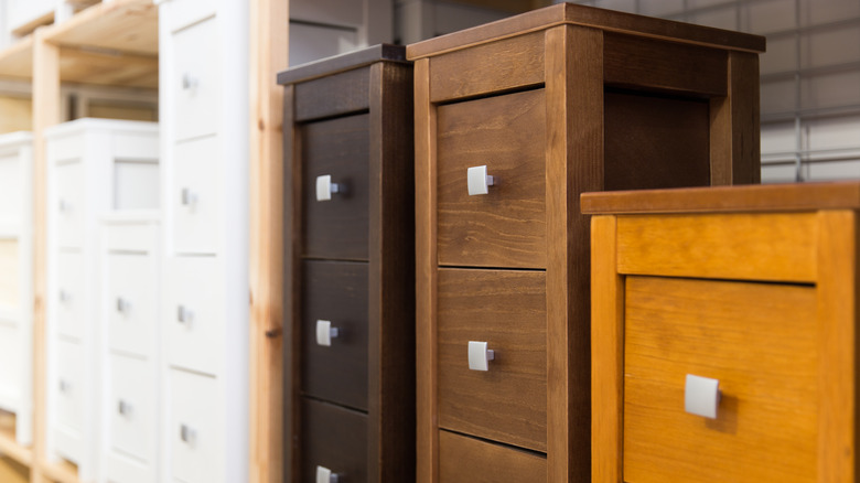 multiple nightstands of different heights