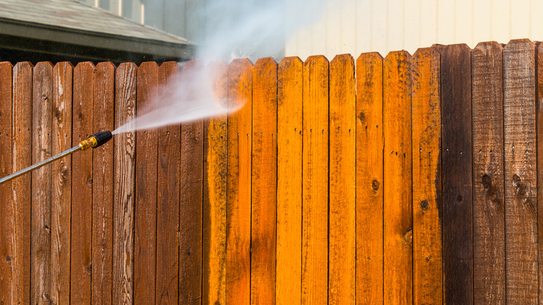 power washing a fence