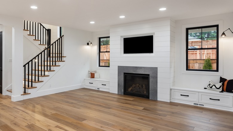 shiplap around basement fireplace